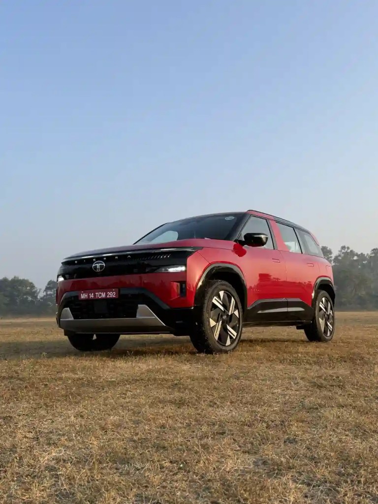 red maroon tata sierra suv front view low angle outdoor
